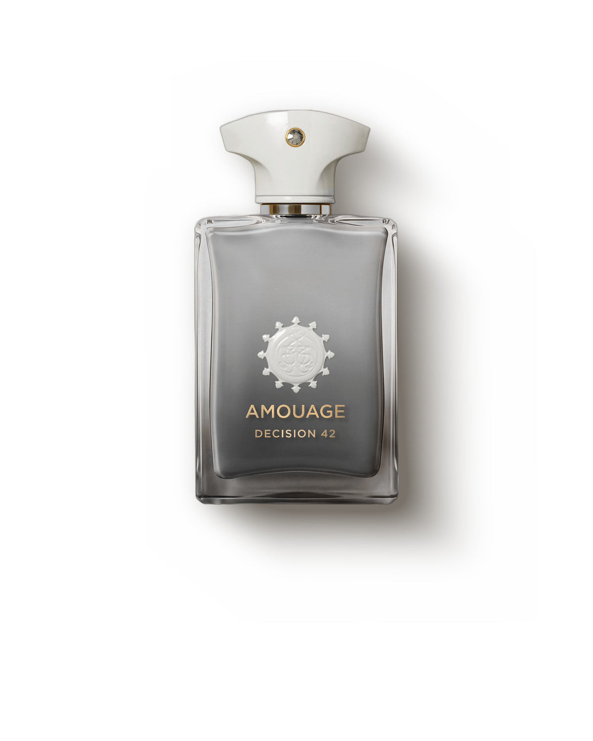 Amouage Decision 42, front view: a grey bottle shading darker toward the base under a white cap set with a crystal, AMOUAGE and DECISION 42 in gold.