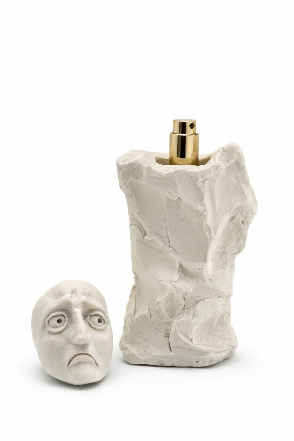 Bidzina Kanchaveli Fear porcelain flacon with the sculpted face lid lifted off, gold atomiser visible, 15ml extrait