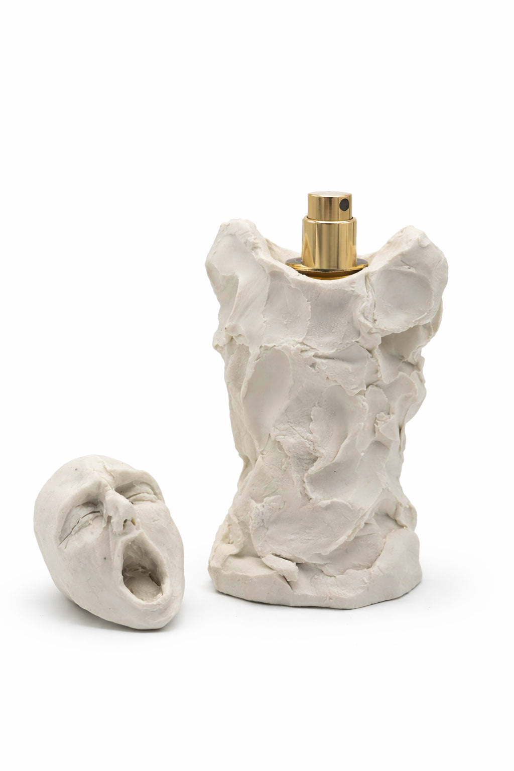 Bidzina Kanchaveli Hate porcelain flacon with the sculpted face lid lifted off, gold atomiser visible, 15ml extrait