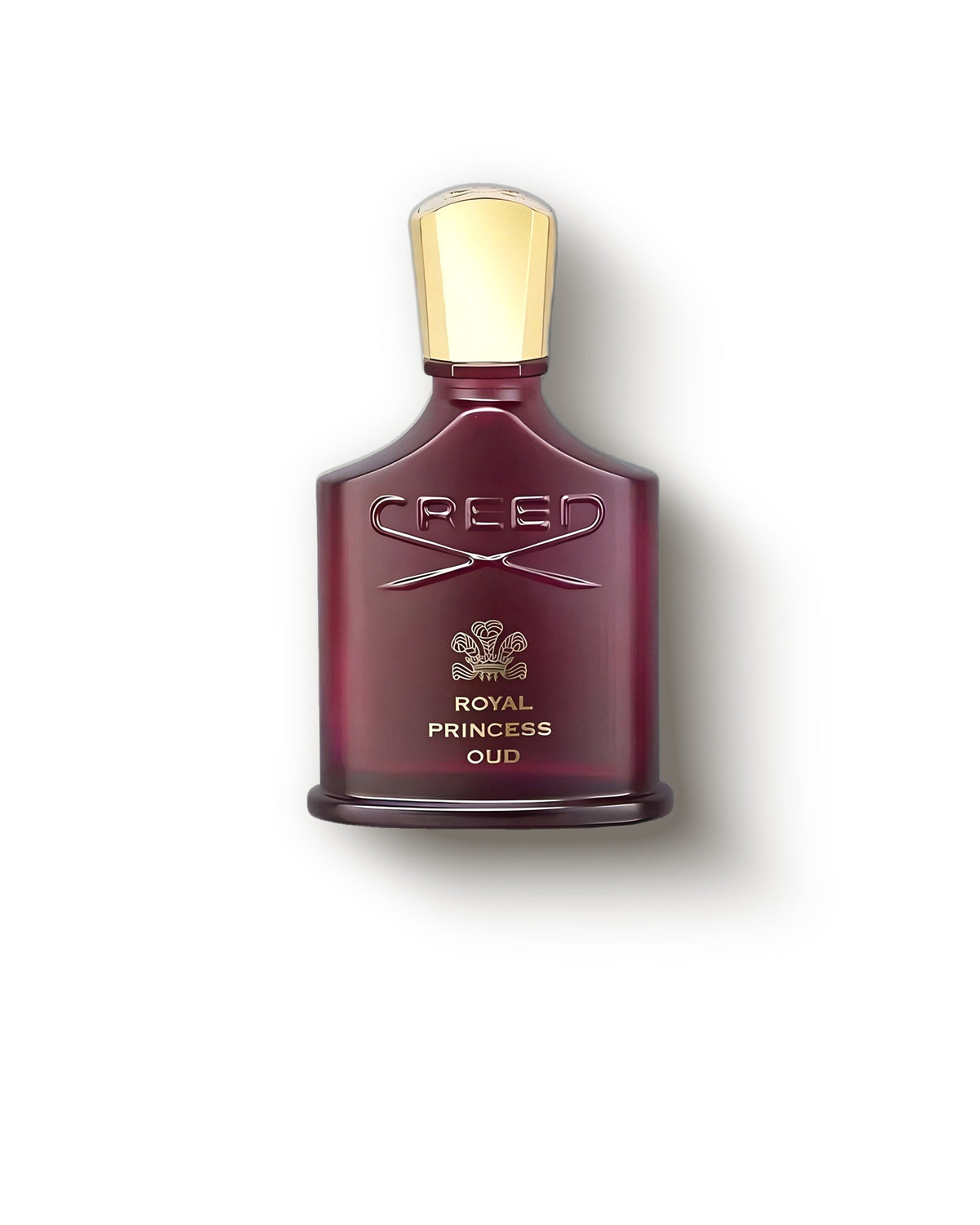 부드러운 크림 배경 위 골드 캡의 옥스블러드 컬러 Creed Royal Princess Oud 보틀, 로즈 우드 니치 향수 디캔트