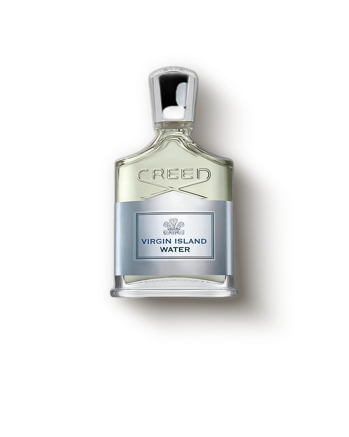 Botol Creed Virgin Island Water dengan tutup krom dan label perak di latar krem, decant parfum niche kelapa jeruk