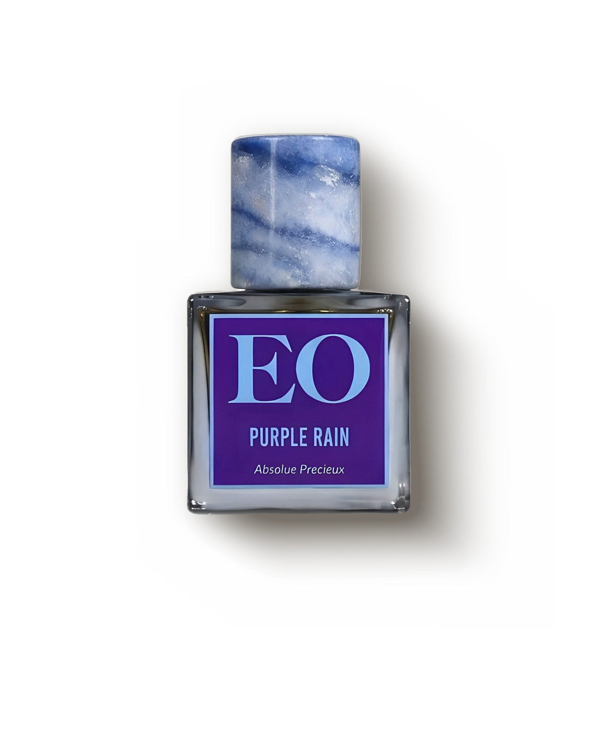 Ensar Oud Purple Rain Uberblau square bottle with blue stone cap on cream, fruity oud extrait decant