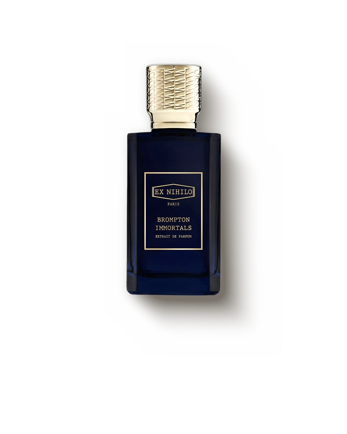 Botol biru tua Ex Nihilo Brompton Immortals bertutup emas di atas krem, extrait de parfum floral dengan dupa