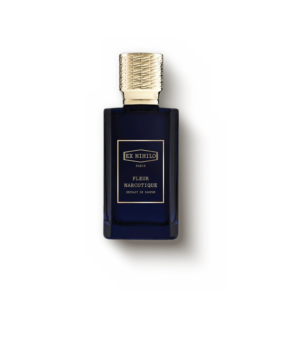Yumuşak gri stüdyo fonunda altın kapaklı lacivert Ex Nihilo Fleur Narcotique şişesi, çiçeksi extrait de parfum dekantı