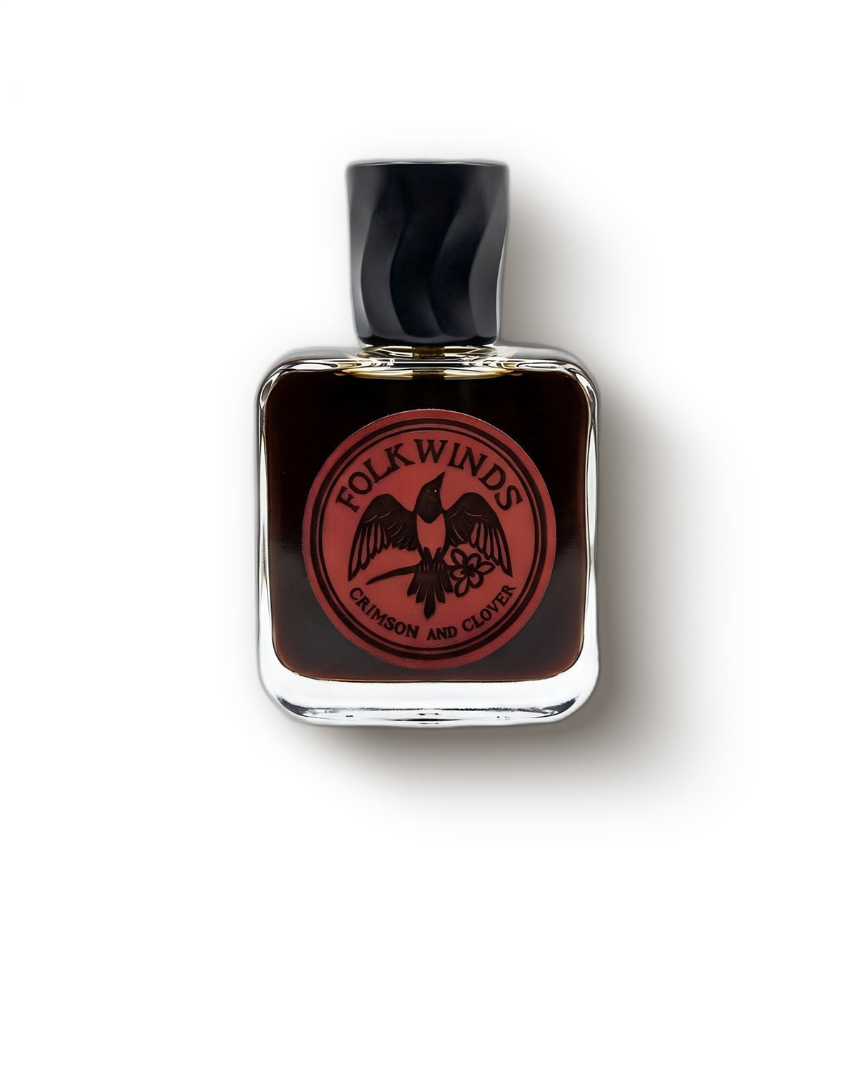 Folkwinds Crimson and Clover bottle with red bird crest on cream, smoky tobacco extrait decant
