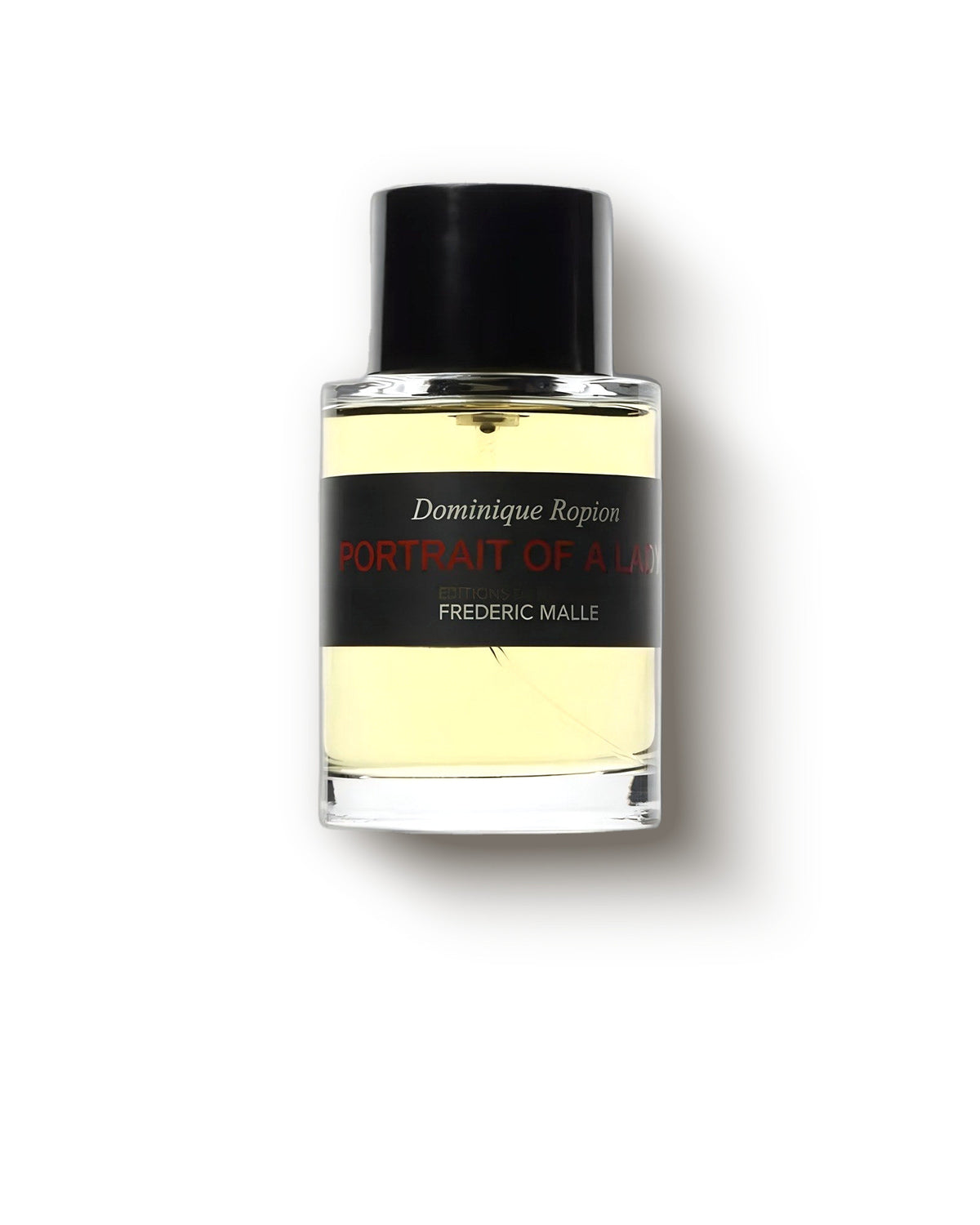 Frédéric Malle Portrait of a Lady, botol bening bertutup hitam di atas abu-abu lembut, decant parfum niche mawar dan dupa