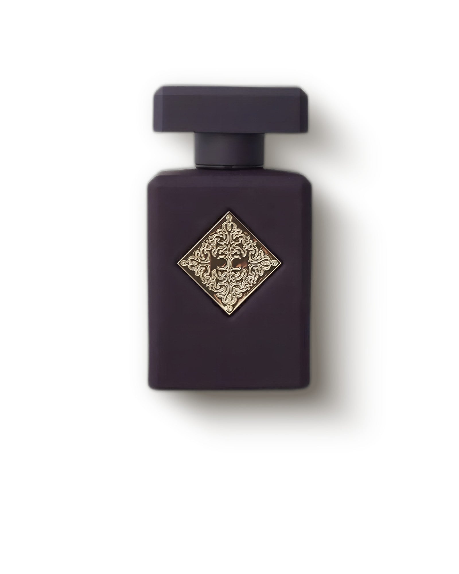 Initio Parfums Privés Side Effect matte plum bottle with ornate gold emblem on cream, boozy tobacco niche perfume decant