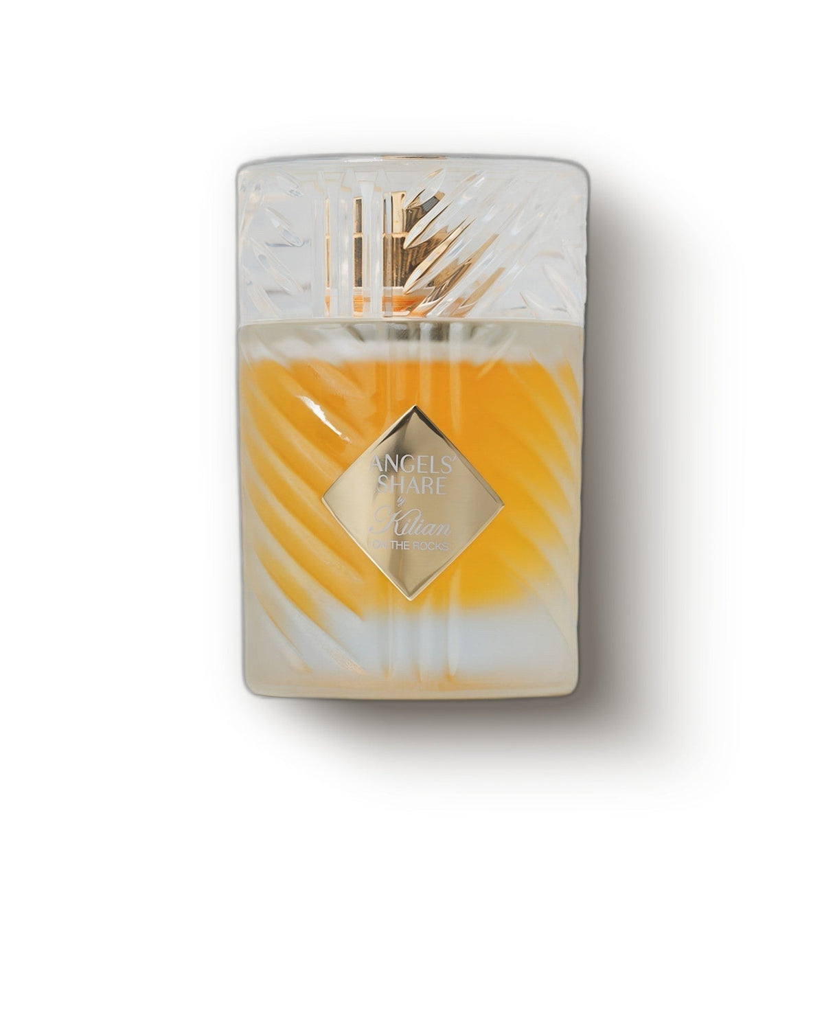 Kilian Angels' Share on the Rocks faceted crystal flacon with amber liquid on cream, boozy gourmand fragrance decant