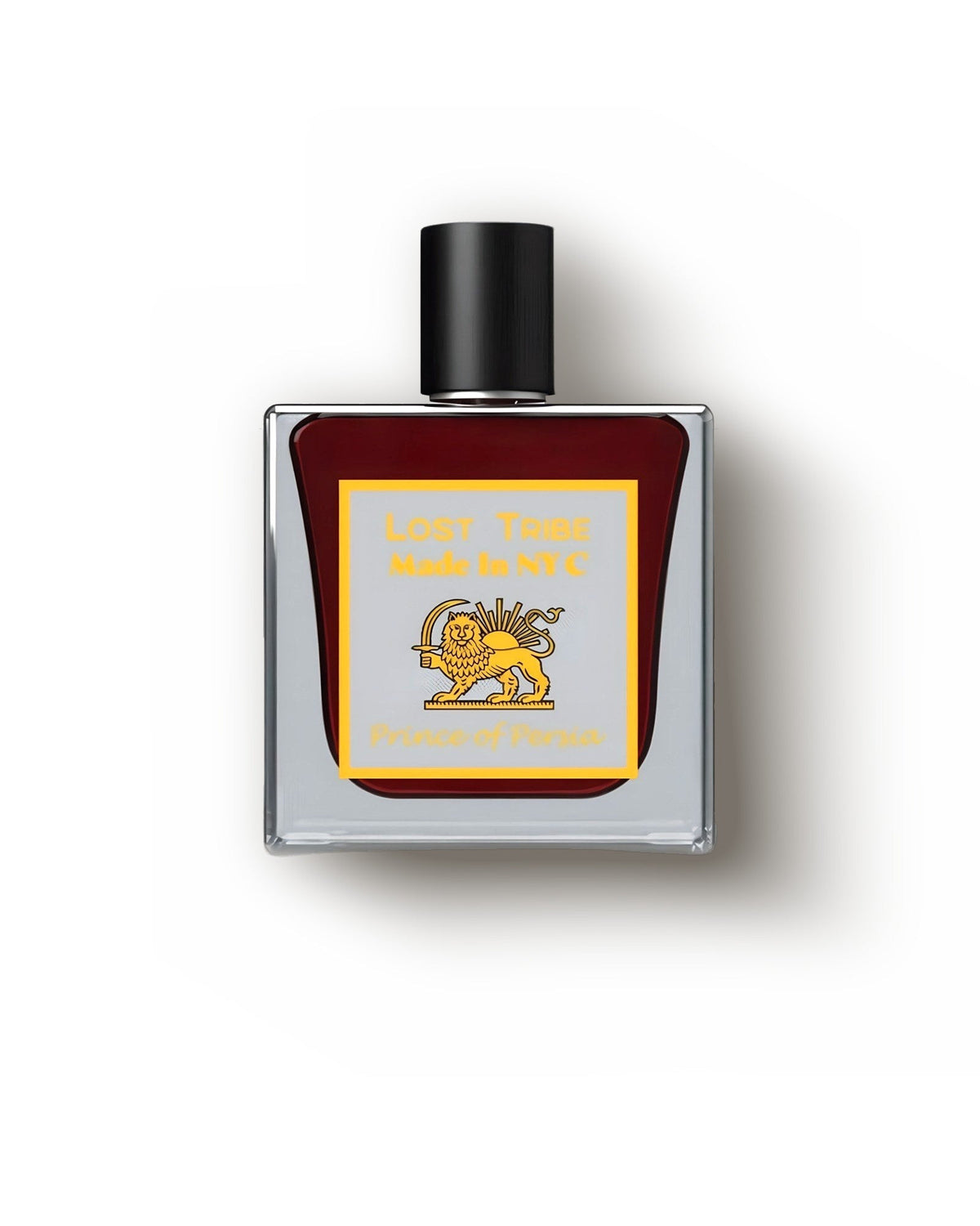 Lost Tribe Prince of Persia bottle of deep red extrait with gold lion-and-sun label on cream, oud rose niche perfume decant