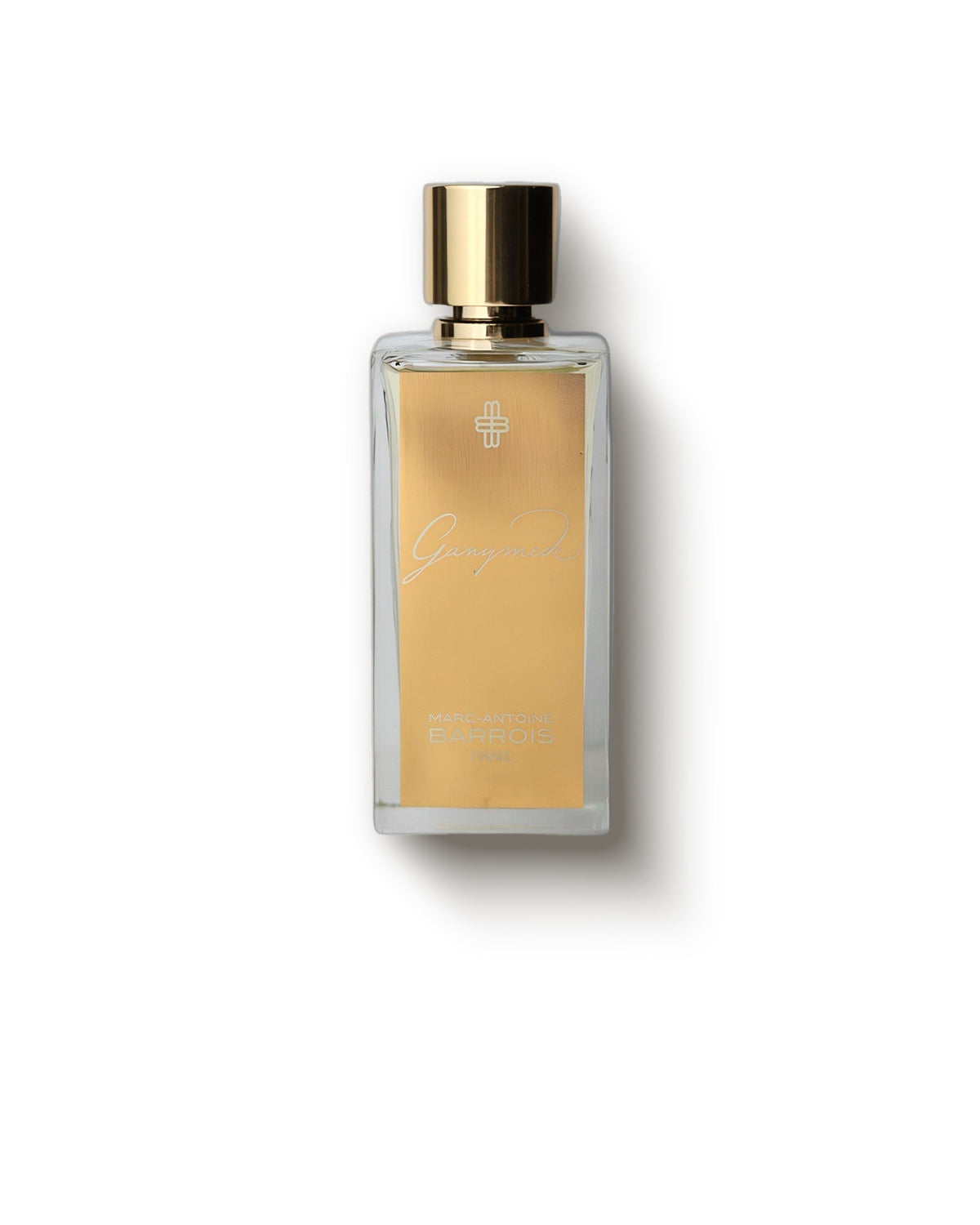 Marc-Antoine Barrois Ganymede gold-label bottle on a soft cream backdrop, mineral suede niche perfume decant