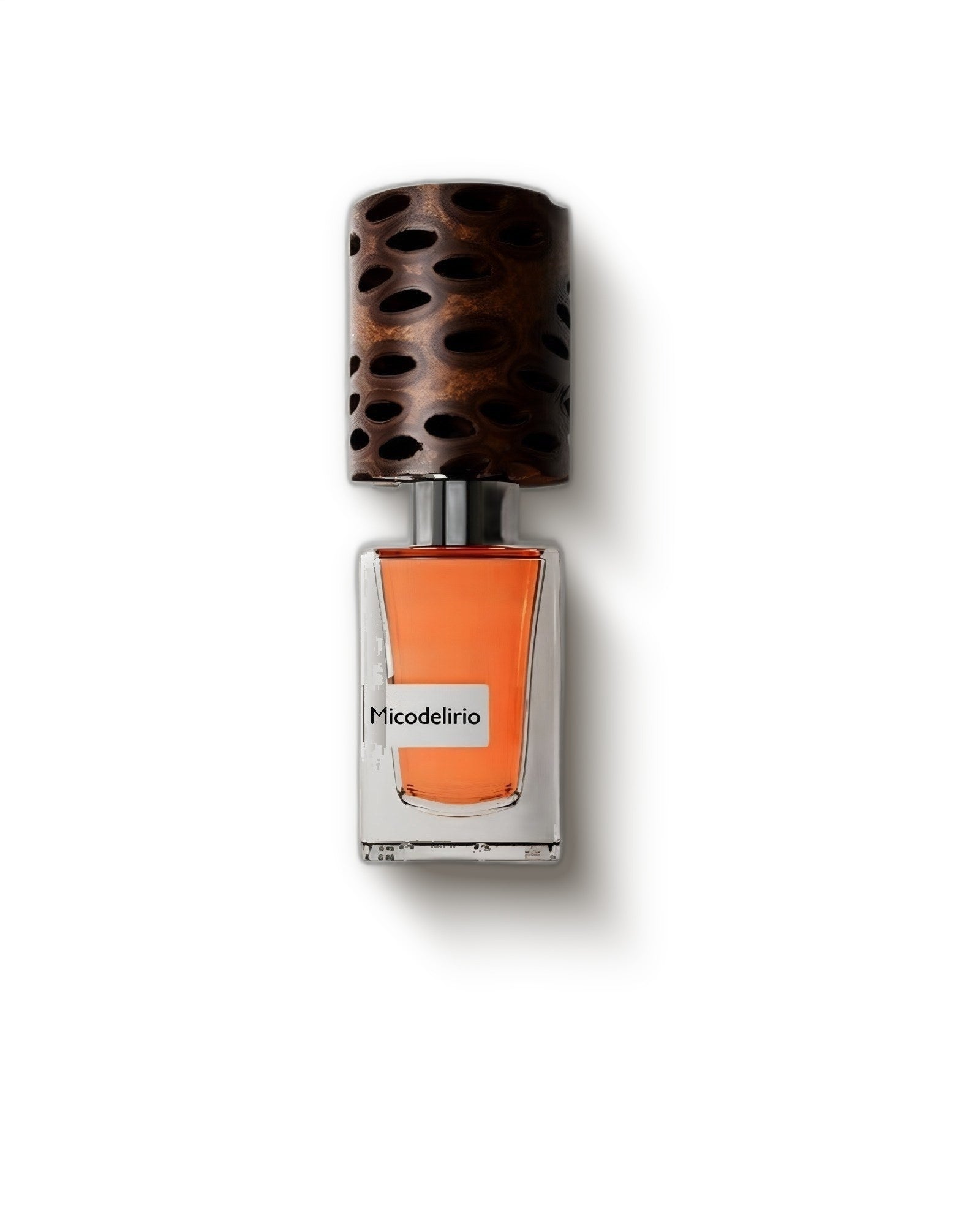 Nasomatto Micodelirio bottle with carved wood cap and amber juice on soft cream, mossy woody extrait de parfum decant