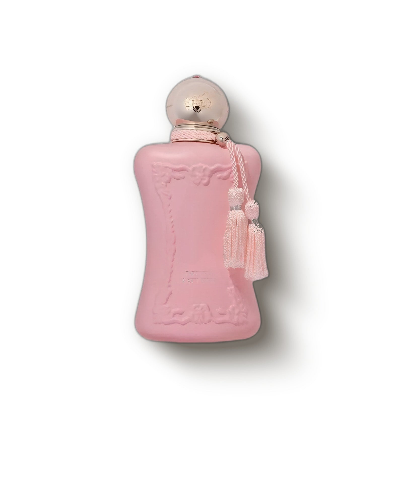 Parfums de Marly Delina Exclusif frosted pink bottle with gold cap and tassel on cream, floral rose extrait decant