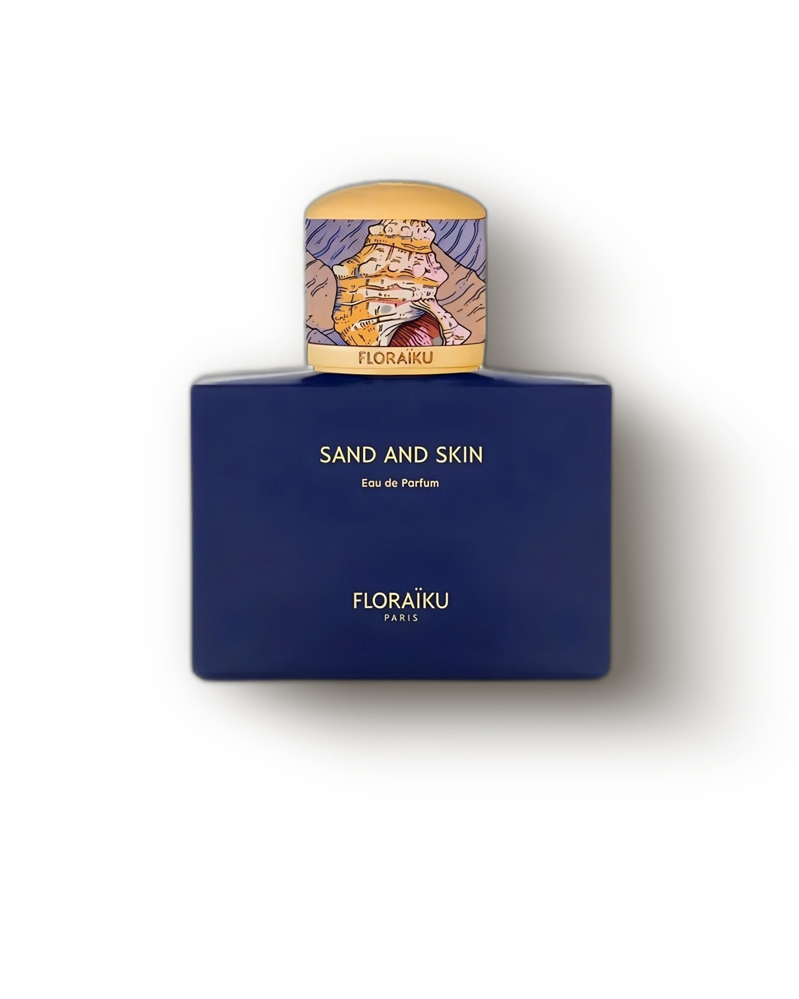 Floraiku Sand and Skin cobalt bottle with gold illustrated cap on cream, musky vanilla niche perfume decant