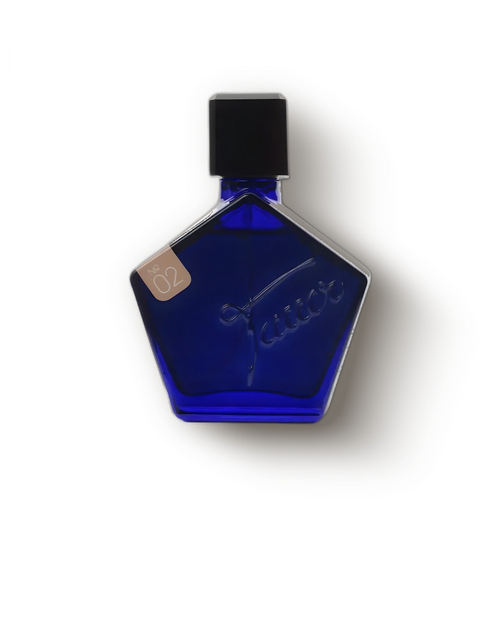 Tauer Perfumes L'Air du Desert Marocain pentagon cobalt bottle on cream, resinous amber niche perfume decant