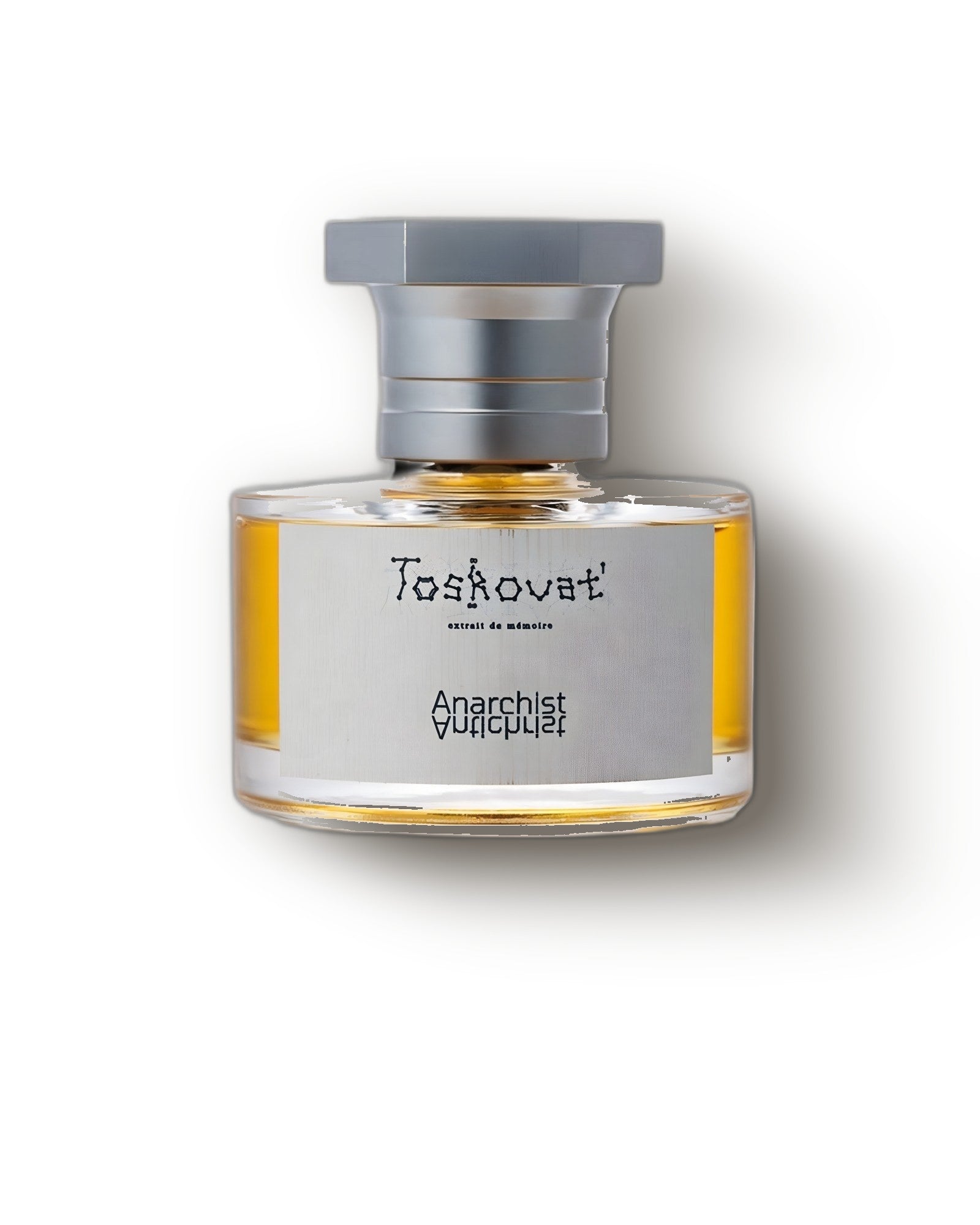 Toskovat Anarchist A♭ bottle of amber extrait de parfum on a soft grey studio backdrop, woody niche perfume decant