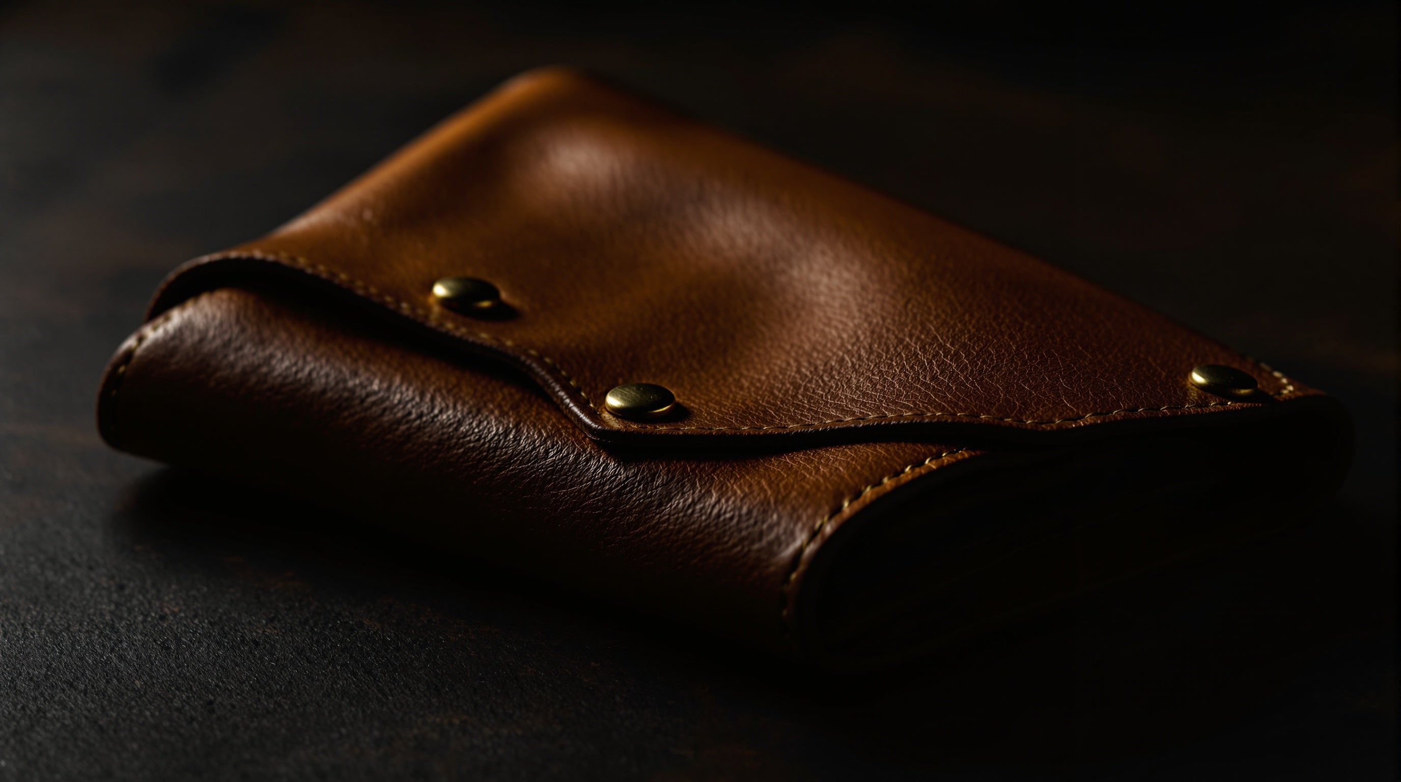 Rich tan leather with brass studs