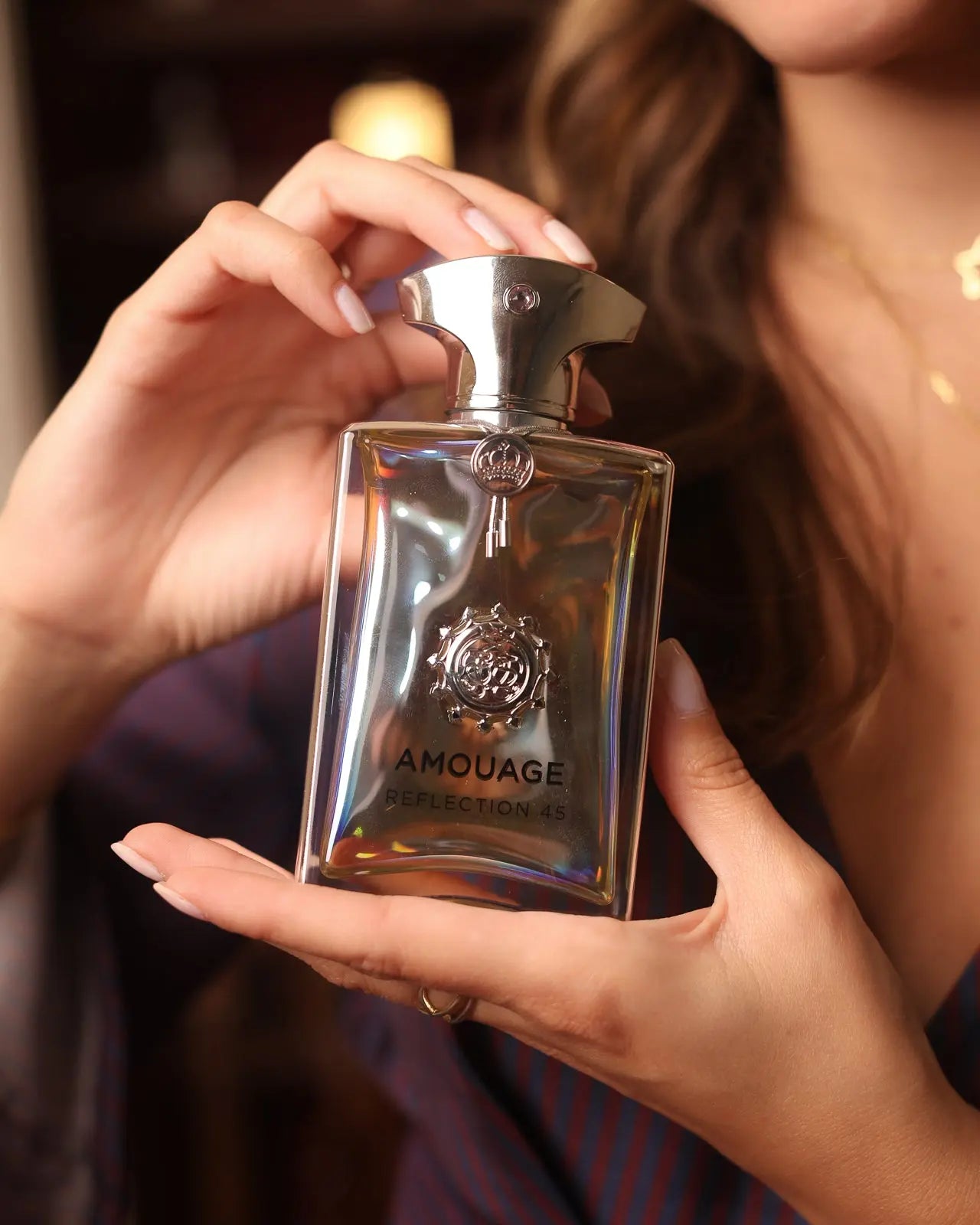 Reflection 45 by Amouage is a masterful blend of fresh, aromatic, and woody accords.