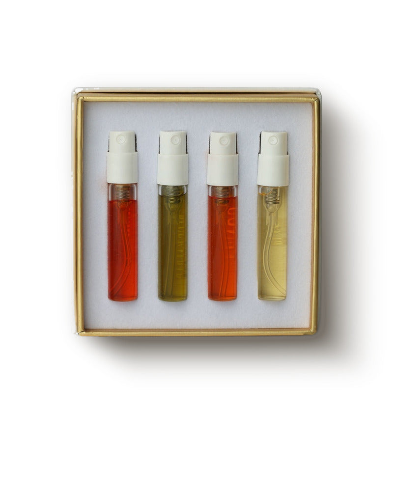 مجموعة اكتشاف عطور نيش من Gouttes Rares، أربع قوارير رذاذ 2 مل بعطر كهرماني وذهبي في علبة بحافة ذهبية