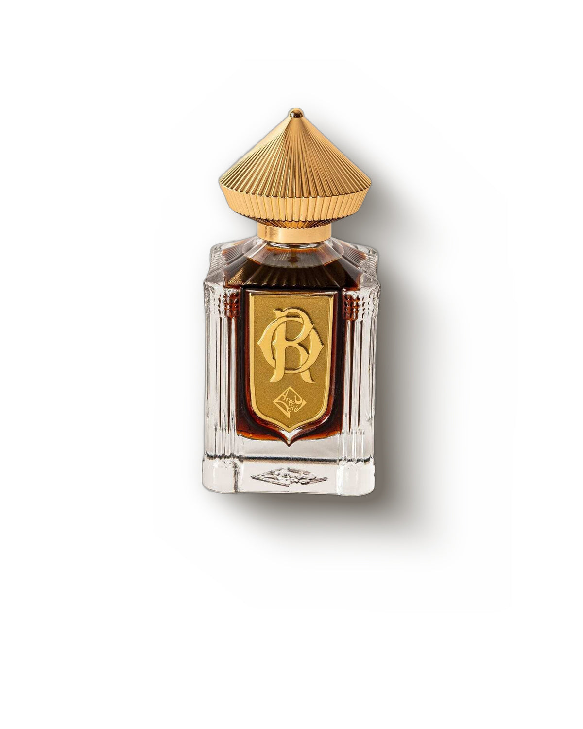 Areej Le Doré Russian Oud 2, front view: a faceted clear bottle of amber-brown juice with a gold shield label bearing an RO monogram and a fluted gold cone cap.