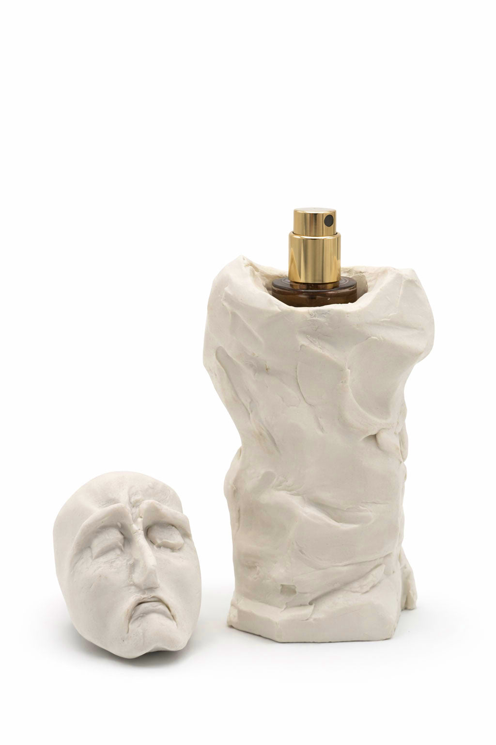 Bidzina Kanchaveli Grief porcelain flacon with the sculpted face lid lifted off, gold atomiser visible, 15ml extrait