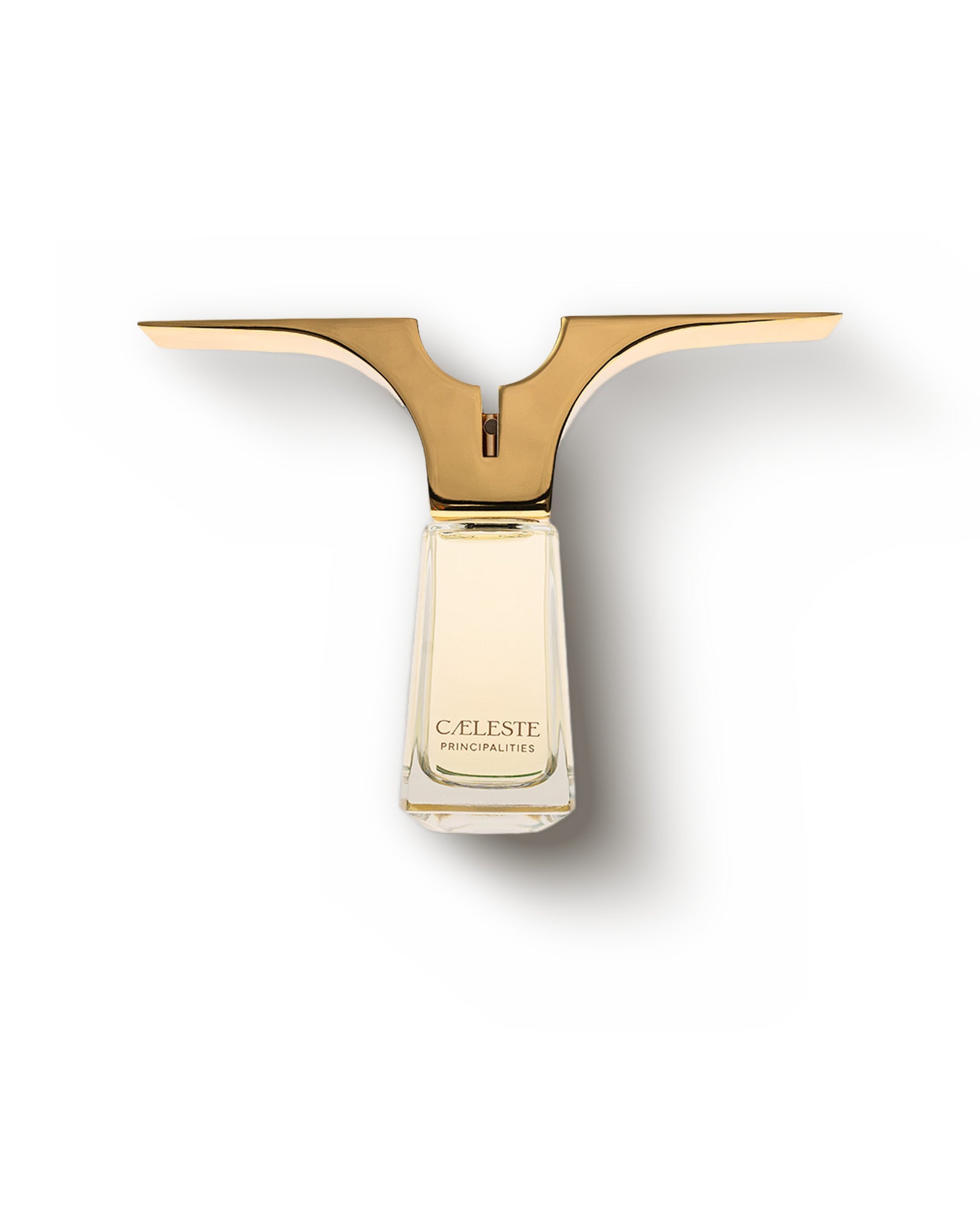 The Caeleste Principalities flacon seen straight on, the gold winged cap spread level above the clear tapered glass engraved CAELESTE PRINCIPALITIES, against a plain pale ground.