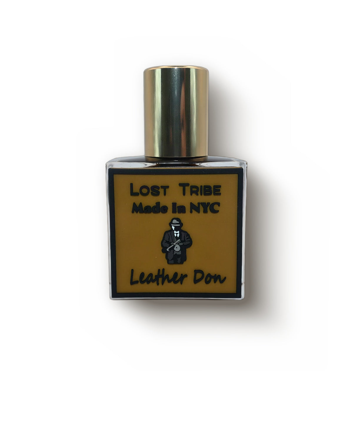 Lost Tribe Leather Don, front view: a square glass bottle with a gold cap and a mustard label showing a figure in a fedora above the name Leather Don.